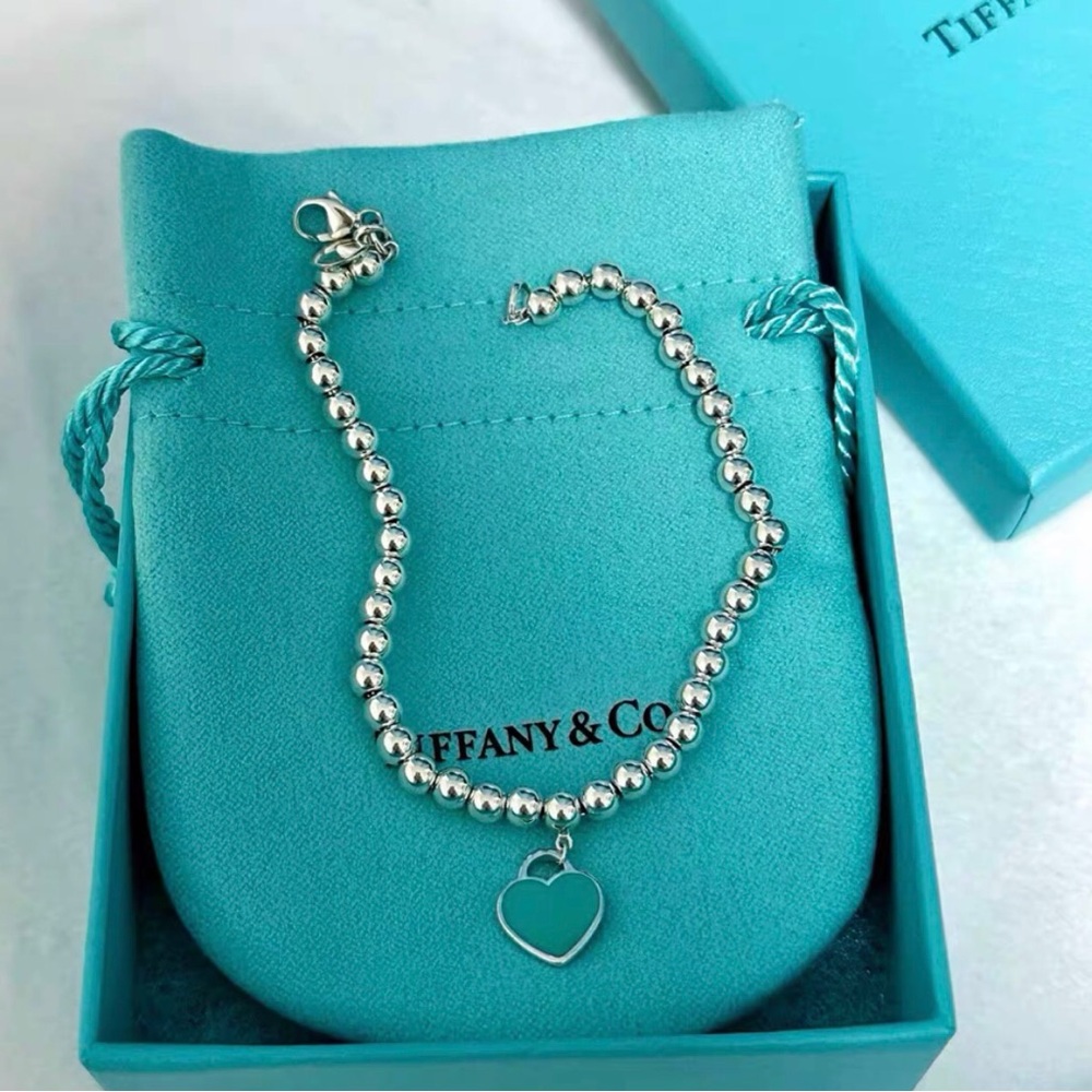 Tiffany & Co. Silver Bracelet with Turquoise Heart Charm